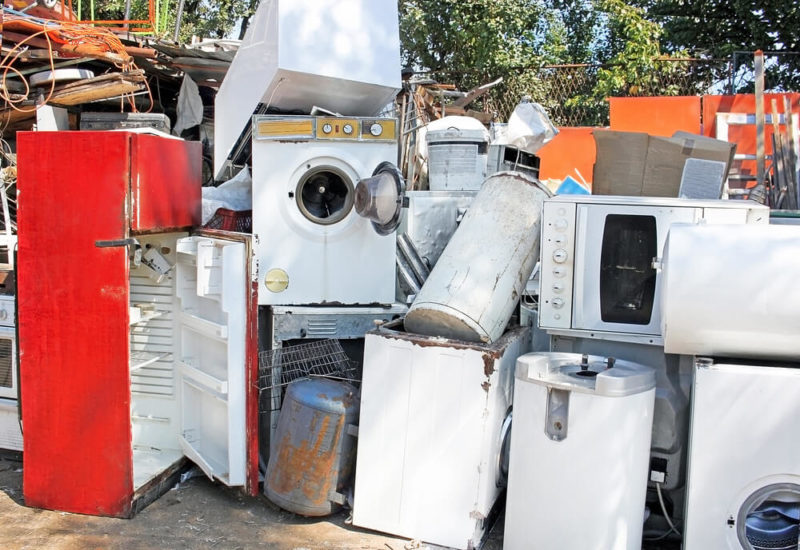 Old appliances in need of appliance removal services